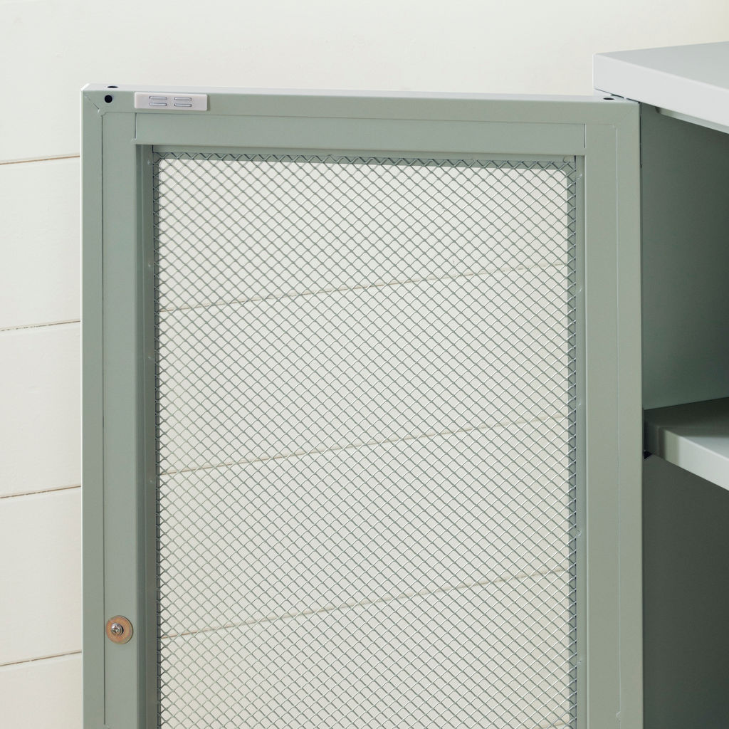 Storage unit with metal mesh doors