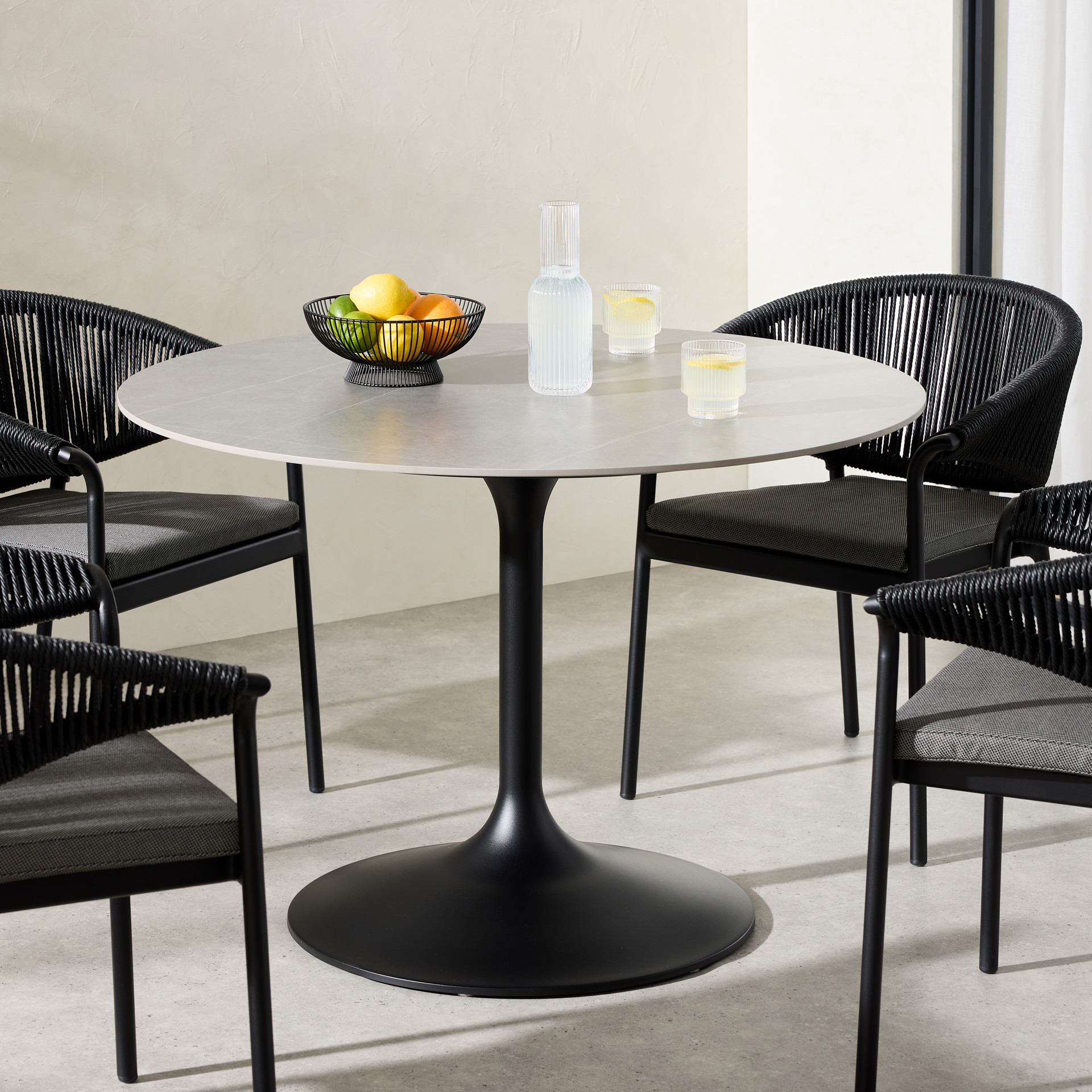 Round Black Outdoor Dining Table: Stylish, Durable & Elegant Choices 2 Round Black Outdoor Dining Table: Stylish, Durable & Elegant Choices